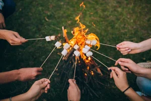 depositphotos 111773384 stock photo sticks with marshmallows above campfire
